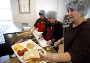 Jewell Sandland serves lunch at the Mustang Senior Center, Thursday, Dec. 10, 2009, at the Mustang Senior Center in Mustang, Okla. Photo by Sarah Phipps, The Oklahoman ORG XMIT: KOD